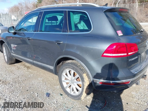 2016 Volkswagen Touareg Sport with VIN WVGEF9BP2GD005315, listed as a IAAI auction lot 41588590 with 134,709 mi miles and . Bid and sale history available at DreamBid. Image 3.