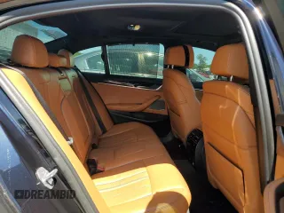2018 BMW 5 Series M550i xDrive with VIN WBAJB9C56JB286479, listed as a Copart auction lot 57108645 with 71,782 mi miles and Salvage title. Bid and sale history available at DreamBid. Image 10.