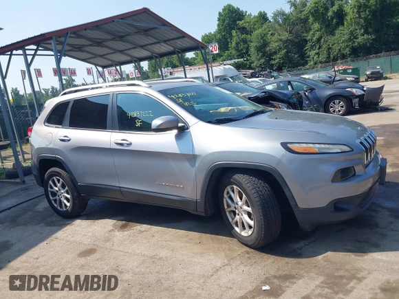 2015 Jeep Cherokee Latitude with VIN 1C4PJMCS2FW789144, listed as a IAAI auction lot 42837222 with 99,759 mi miles and . Bid and sale history available at DreamBid. Image 14.