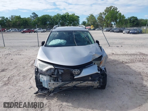 2017 Toyota RAV4 LE with VIN 2T3ZFREV2HW324895, listed as a IAAI auction lot 39150601 with 111,676 mi miles and . Bid and sale history available at carsss.com. Image 6.