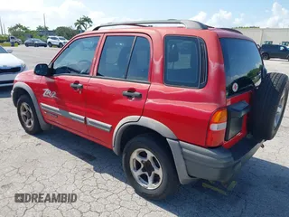 2003 Chevrolet Tracker ZR2 z VIN 2CNBJ734736914220, wystawiony jako IAAI lot #42351611 z przebiegiem 190 578 mil mil oraz . Historia ofert i sprzedaży dostępna na DreamBid. Obrazek 3.