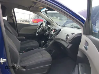 2013 Chevrolet Sonic LT with VIN 1G1JC6SB1D4171148, listed as a IAAI auction lot 41631280 with 147,874 mi miles. Bid and sale history available at carsss.com. Image 5.