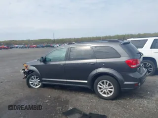 2017 Dodge Journey SXT with VIN 3C4PDDBG5HT618563, listed as a IAAI auction lot 42015188 with 104,747 mi miles and . Bid and sale history available at DreamBid. Image 14.