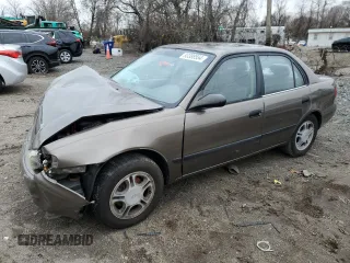 2000 Chevrolet Prizm z VIN 1Y1SK5283YZ425556, wystawiony jako Copart lot #83388554 z przebiegiem 104 580 mil mil oraz Szkody całkowita. Historia ofert i sprzedaży dostępna na DreamBid. Obrazek 1.