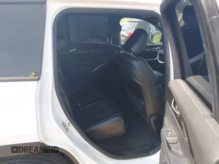 2023 Jeep Grand Cherokee Altitude with VIN 1C4RJHAG4P8106056, listed as a IAAI auction lot 42275021 with 27,251 mi miles and . Bid and sale history available at DreamBid. Image 8.