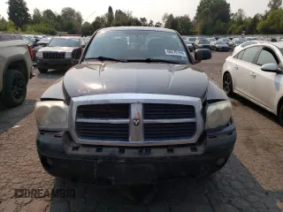2005 Dodge Dakota Laramie with VIN 1D7HW58N65S161629, listed as a Copart auction lot 66570164 with 205,984 mi miles and Salvage Title. Bid and sale history available at carsss.com. Image 5.