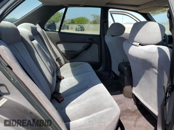 1994 Toyota Camry LE z VIN JT2GK12E6R0055565, wystawiony jako Copart lot #54031255 z przebiegiem 240 841 mil mil oraz Szkoda całkowita • Salvage title. Historia ofert i sprzedaży dostępna na DreamBid. Obrazek 10.