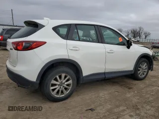 2015 Mazda CX-5 Sport z VIN JM3KE4BY2F0516574, wystawiony jako Copart lot #84100544 z przebiegiem Nie podano mil oraz Szkoda całkowita • Salvage title. Historia ofert i sprzedaży dostępna na DreamBid. Obrazek 3.