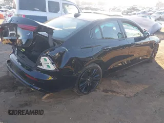 2024 Volvo S60 Plus Black Edition with VIN 7JRH60FH9RG311382, listed as a IAAI auction lot 41297866 with 12,805 mi miles and . Bid and sale history available at DreamBid. Image 4.