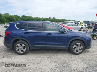 2021 Hyundai Santa Fe SE with VIN 5NMS14AJ2MH323542, listed as a IAAI auction lot 42182576 with 69,385 mi miles and . Bid and sale history available at DreamBid. Image 13.