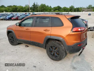 2015 Jeep Cherokee Trailhawk with VIN 1C4PJMBS0FW675807, listed as a Copart auction lot 58800615 with 109,019 mi miles and Salvage title. Bid and sale history available at DreamBid. Image 2.