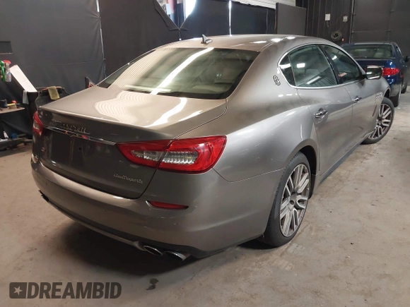2015 Maserati Quattroporte S Q4 z VIN ZAM56RRAXF1158381, wystawiony jako IAAI lot #39717772 z przebiegiem 100 836 mil mil oraz . Historia ofert i sprzedaży dostępna na DreamBid. Obrazek 4.