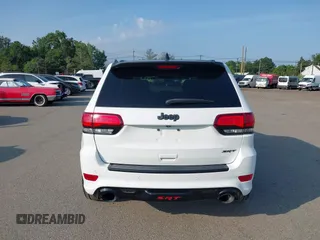 2016 Jeep Grand Cherokee SRT with VIN 1C4RJFDJ3GC503878, listed as a IAAI auction lot 42830257 with 82,661 mi miles and . Bid and sale history available at DreamBid. Image 16.
