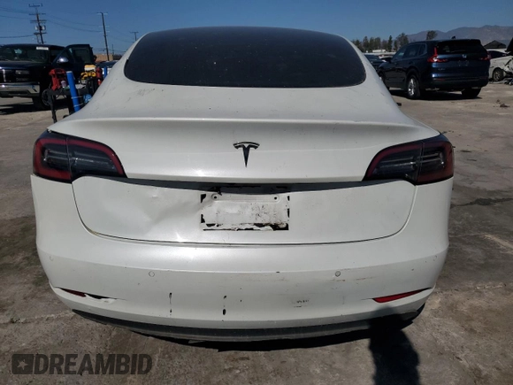 2021 Tesla Model 3 Standard Range Plus with VIN 5YJ3E1EA8MF874156, listed as a Copart auction lot 46323505 with Not Provided miles and Salvage Title. Bid and sale history available at DreamBid. Image 6.
