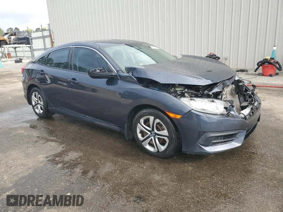 2017 Honda Civic LX with VIN 19XFC2F53HE033738, listed as a Copart auction lot 51534615 with 129,960 mi miles and Salvage Title. Bid and sale history available at DreamBid. Image 4.