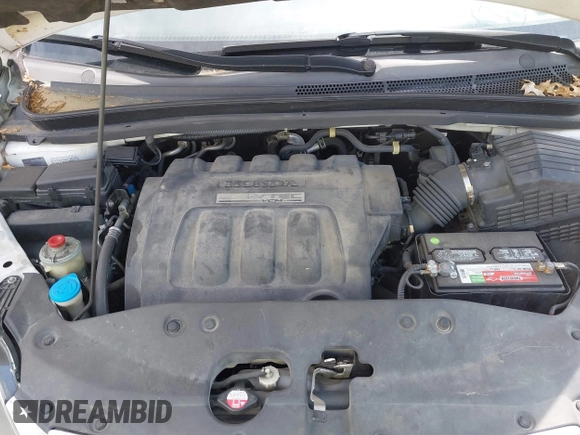 2007 Honda Odyssey EX-L with VIN 5FNRL38787B144585, listed as a IAAI auction lot 42139957 with 211,412 mi miles and . Bid and sale history available at DreamBid. Image 10.