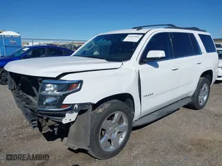 2015 Chevrolet Tahoe LT with VIN 1GNSCBKCXFR218669, listed as a IAAI auction lot 41829584 with 153,804 mi miles. Bid and sale history available at carsss.com. Image 18.