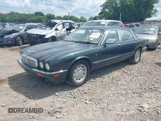1999 Jaguar XJ with VIN SAJKD6048XC869099, listed as a IAAI auction lot 42761055 with 124,326 mi miles and . Bid and sale history available at DreamBid. Image 2.