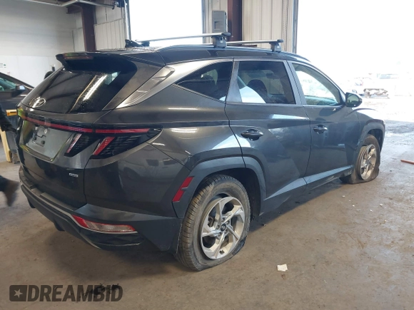 2022 Hyundai Tucson SEL with VIN 5NMJBCAE6NH035482, listed as a IAAI auction lot 41759838 with 70,418 mi miles. Bid and sale history available at carsss.com. Image 4.