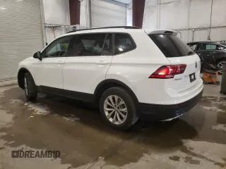 2018 Volkswagen Tiguan S with VIN 3VV1B7AX4JM118670, listed as a Copart auction lot 57055935 with 104,443 mi miles and Salvage title. Bid and sale history available at DreamBid. Image 2.