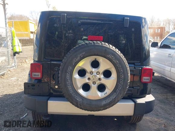 2015 Jeep Wrangler Unlimited Sahara with VIN 1C4BJWEGXFL506361, listed as a IAAI auction lot 41865418 with 80,841 mi miles. Bid and sale history available at carsss.com. Image 16.