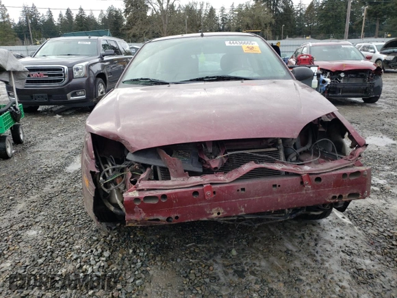 2006 Ford Focus S z VIN 1FAHP31N26W257733, wystawiony jako Copart lot #44436665 z przebiegiem 245 006 mil mil oraz Szkoda całkowita • Salvage title. Historia ofert i sprzedaży dostępna na DreamBid. Obrazek 5.