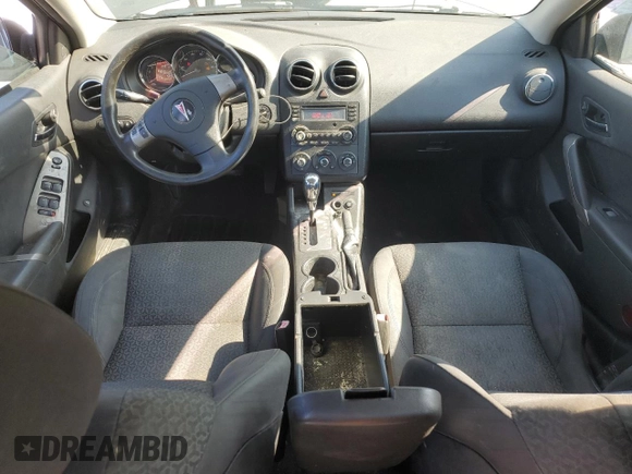 2008 Pontiac G6 z VIN 1G2ZG57N184281946, wystawiony jako Copart lot #54887675 z przebiegiem 211 804 mil mil oraz Tytuł czysty. Historia ofert i sprzedaży dostępna na DreamBid. Obrazek 8.
