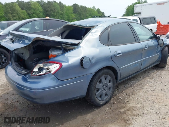 2001 Ford Taurus z VIN 1FAFP52211A244260, wystawiony jako IAAI lot #42099611 z przebiegiem 148 874 mil mil oraz . Historia ofert i sprzedaży dostępna na DreamBid. Obrazek 4.