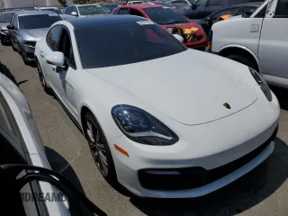 2021 Porsche Panamera с VIN WP0AJ2A72ML115633, выставлен на аукционе Copart как лот 62893184 с пробегом 32 883 миль миль и Списание • Salvage title. История ставок и продаж доступна на DreamBid. Изображение 4.