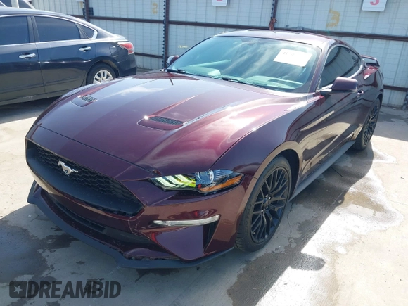 2018 Ford Mustang EcoBoost z VIN 1FA6P8TH3J5132136, wystawiony jako IAAI lot #41741496 z przebiegiem 62 526 mil mil oraz . Historia ofert i sprzedaży dostępna na DreamBid. Obrazek 19.
