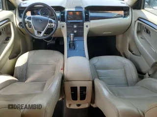 2014 Ford Taurus Limited с VIN 1FAHP2F89EG120939, выставлен на аукционе Copart как лот 59204815 с пробегом 180 105 миль миль и Списание • Salvage title. История ставок и продаж доступна на DreamBid. Изображение 8.