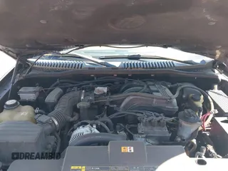 2003 Mercury Mountaineer Convenience z VIN 4M2DU86K43ZJ10878, wystawiony jako IAAI lot #42390874 z przebiegiem 194 867 mil mil oraz . Historia ofert i sprzedaży dostępna na DreamBid. Obrazek 10.