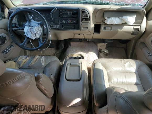 1998 GMC Suburban z VIN 3GKFK16R1WG503206, wystawiony jako Copart lot #69802344 z przebiegiem 231 148 mil mil oraz Szkody całkowita. Historia ofert i sprzedaży dostępna na DreamBid. Obrazek 8.