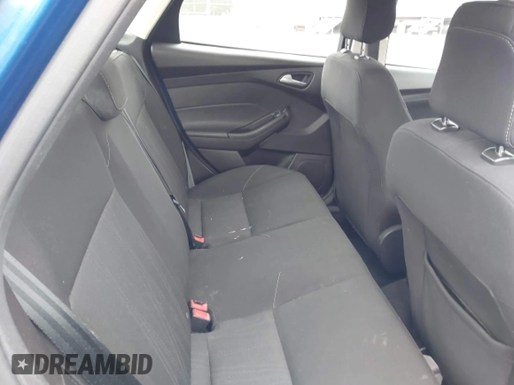 2018 Ford Focus SE z VIN 1FADP3F23JL200674, wystawiony jako IAAI lot #42009238 z przebiegiem 78 007 mil mil oraz . Historia ofert i sprzedaży dostępna na DreamBid. Obrazek 8.