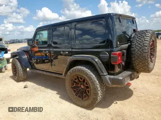 2020 Jeep Wrangler Unlimited Rubicon with VIN 1C4HJXFG5LW107933, listed as a Copart auction lot 62012515 with 60,115 mi miles and Salvage title. Bid and sale history available at DreamBid. Image 2.