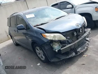 2015 Toyota Sienna LE AAS with VIN 5TDKK3DC9FS586406, listed as a IAAI auction lot 42703760 with 87,996 mi miles and . Bid and sale history available at DreamBid. Image 1.
