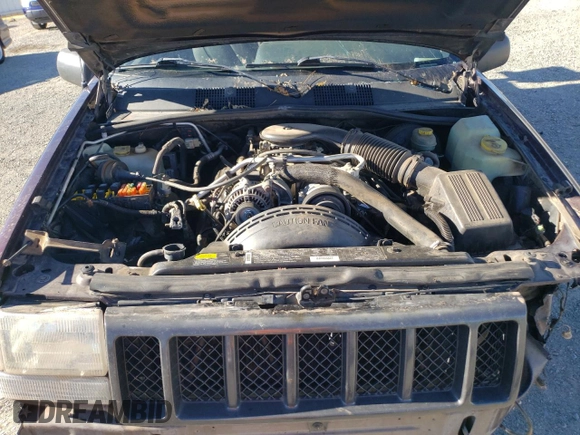 1997 Jeep Grand Cherokee Laredo with VIN 1J4GZ58Y3VC653093, listed as a Copart auction lot 79576964 with 0 mi miles and Salvage Title. Bid and sale history available at carsss.com. Image 11.