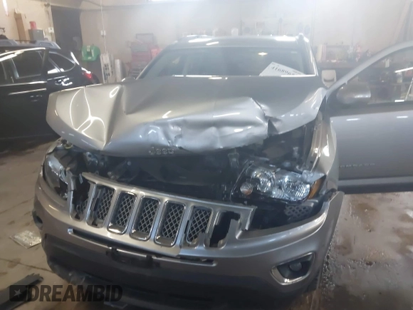 2016 Jeep Compass High Altitude Edition with VIN 1C4NJCEA2GD720148, listed as a IAAI auction lot 41689653 with 97,400 mi miles. Bid and sale history available at carsss.com. Image 6.