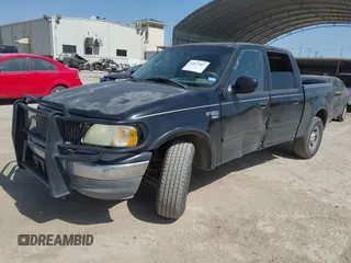 2003 Ford F-150 XLT with VIN 1FTRW07L53KC01651, listed as a IAAI auction lot 41827007 with 233,842 mi miles and . Bid and sale history available at DreamBid. Image 2.