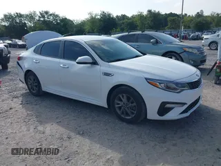 2020 Kia Optima LX with VIN 5XXGT4L30LG390927, listed as a IAAI auction lot 42642424 with 84,697 mi miles and . Bid and sale history available at DreamBid. Image 1.