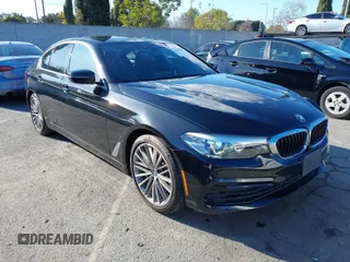 2019 BMW 5 Series 530e iPerformance with VIN WBAJA9C53KB388861, listed as a IAAI auction lot 41621712 with 68,128 mi miles. Bid and sale history available at carsss.com. Image 1.
