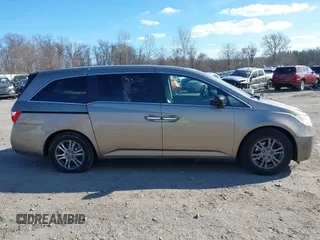 2012 Honda Odyssey EX-L with VIN 5FNRL5H63CB016526, listed as a IAAI auction lot 41701396 with 132,016 mi miles and . Bid and sale history available at carsss.com. Image 14.