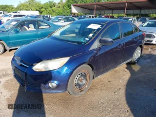 2012 Ford Focus SE with VIN 1FAHP3F28CL126091, listed as a IAAI auction lot 42053457 with 197,393 mi miles. Bid and sale history available at carsss.com. Image 2.