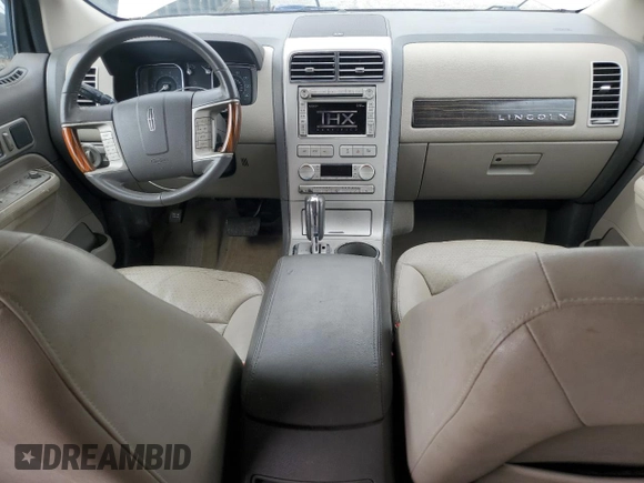 2007 Lincoln MKX z VIN 2LMDU68C97BJ33226, wystawiony jako Copart lot #52607515 z przebiegiem 195 123 mil mil oraz Szkoda całkowita • Salvage title. Historia ofert i sprzedaży dostępna na DreamBid. Obrazek 8.