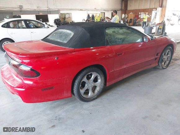 2000 Pontiac Firebird Trans Am with VIN 2G2FV32G7Y2121291, listed as a IAAI auction lot 40095437 with 140293 miles. Bid and sale history available at carsss.com. Image 4.