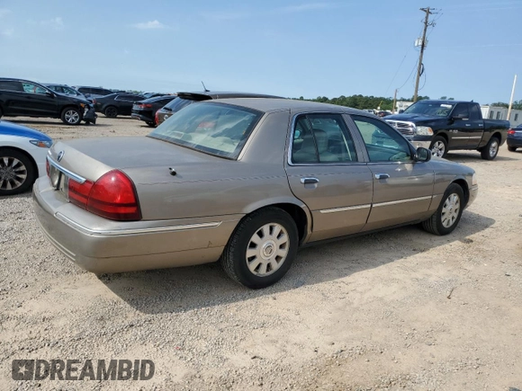 2005 Mercury Grand Marquis LS Premium z VIN 2MEFM75W65X609038, wystawiony jako Copart lot #55766005 z przebiegiem 132 136 mil mil oraz Szkoda całkowita • Salvage title. Historia ofert i sprzedaży dostępna na DreamBid. Obrazek 3.