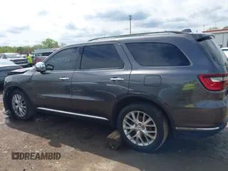 2014 Dodge Durango Citadel with VIN 1C4RDJEG7EC493379, listed as a IAAI auction lot 42159732 with 184,373 mi miles and . Bid and sale history available at DreamBid. Image 14.