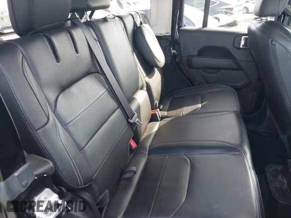 2023 Jeep Wrangler Sahara with VIN 1C4JJXP67PW556933, listed as a IAAI auction lot 41587035 with 20,463 mi miles and . Bid and sale history available at DreamBid. Image 8.