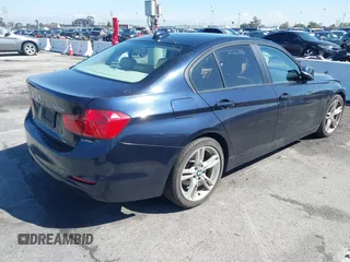 2013 BMW 3 Series 328i with VIN WBA3C1G57DNR46369, listed as a IAAI auction lot 41746413 with 121,584 mi miles and . Bid and sale history available at DreamBid. Image 4.