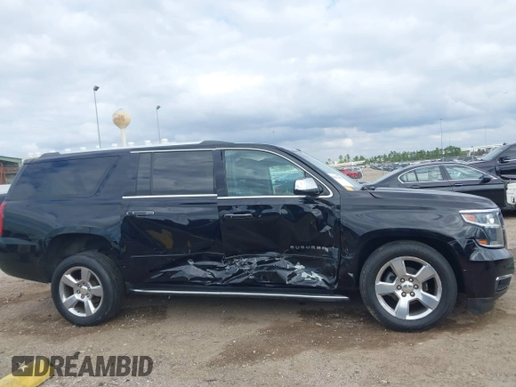 2018 Chevrolet Suburban Premier z VIN 1GNSKJKC2JR250540, wystawiony jako IAAI lot #41475451 z przebiegiem 38 751 mil mil oraz . Historia ofert i sprzedaży dostępna na DreamBid. Obrazek 13.